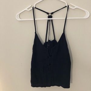 Black tank top with keyhole loop; crosshatch back